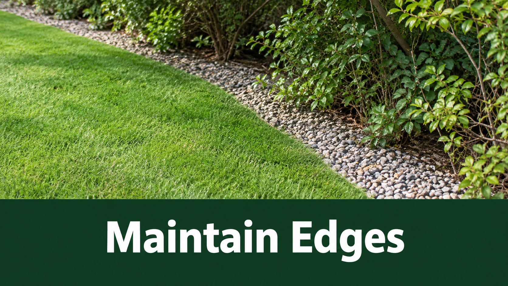 A sharp, well-maintained grass edge separating a green lawn from a decorative rock garden border.